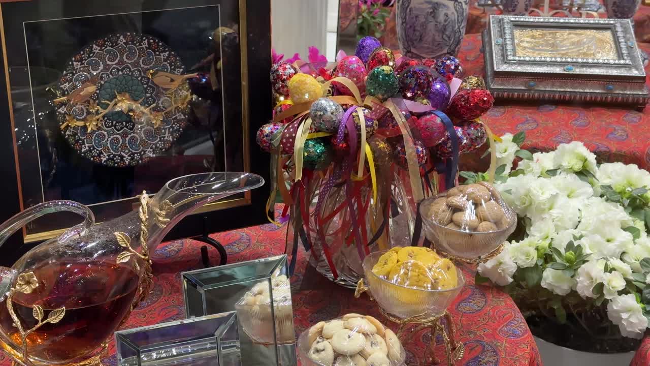 inside House architecture design with traditional candlelit decorative Tehran Nowruz New Year Persian Iran lifestyle Haftsin table ceremony colorful elements grass garlic samanu nuts culture countdown