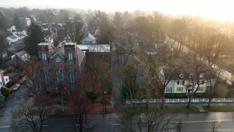 aerial truck shot of town at sunrise