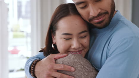 couple giving love hug in home