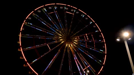 ferris wheel at night in the city batumi, georgia