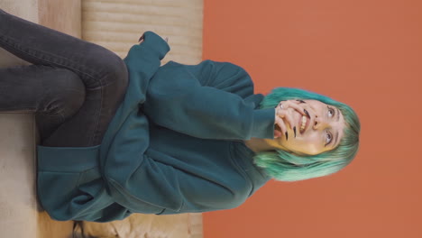 vertical video of happy dreaming young woman.