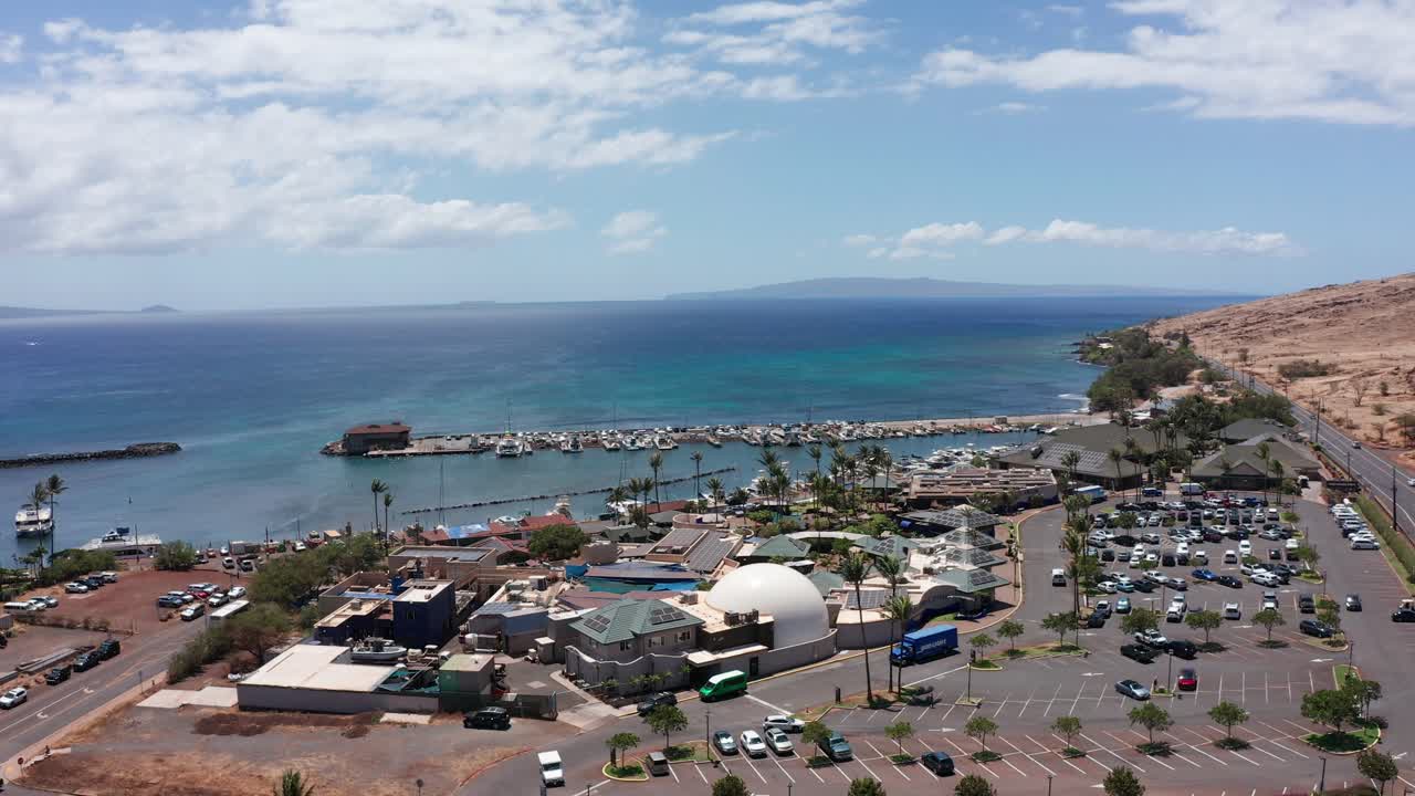 Aerial rising and panning shot of the Maui Ocean Center in West Maui, Hawai'i