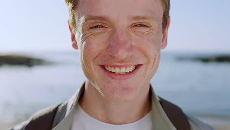 smiling man at the beach