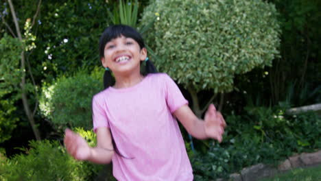 Little-girl-jumping-and-smiling