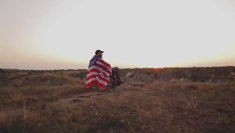 disabled veteran reflecting at sunset