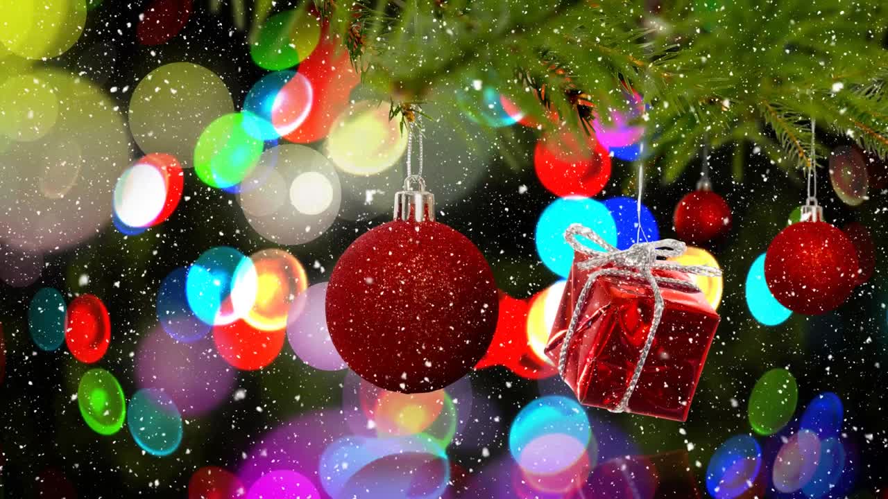 animación de bolas de navidad sobre la nieve que cae
