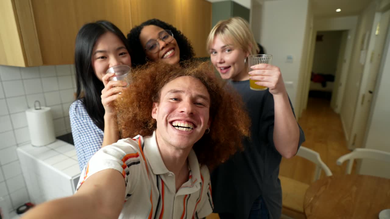 Friends enjoying a party in a kitchen