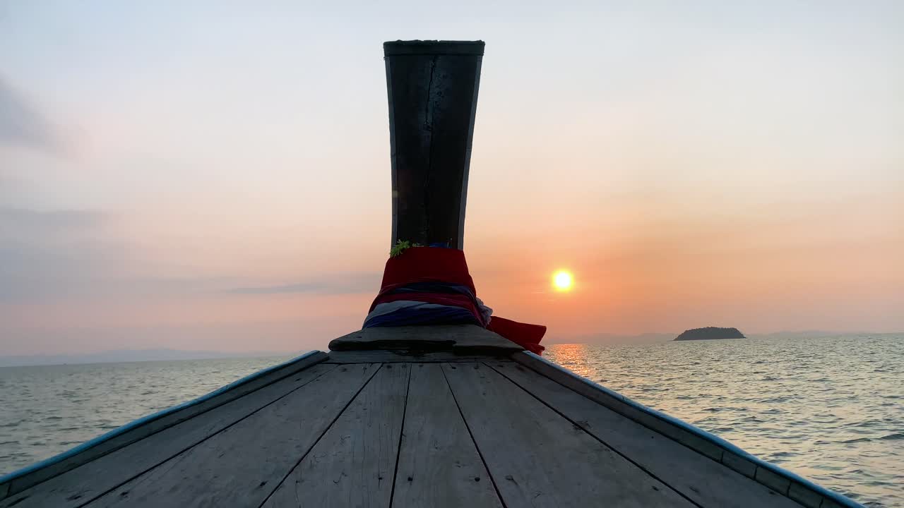 Landscape of the head front of local boat while sailing in sea ocean in early morning time