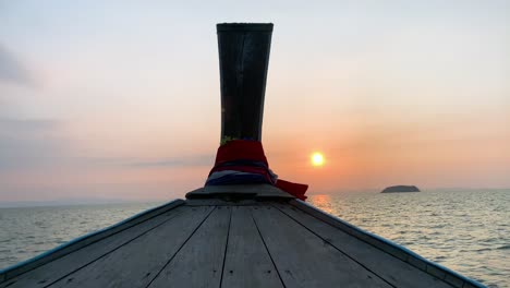 landscape of the head front of local boat while sailing in sea ocean in early morning time