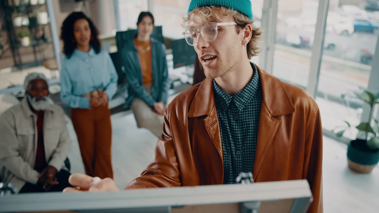 Diverse team collaborating in a modern office environment