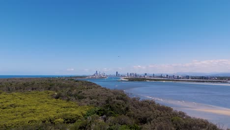 helicopter panorama of coastal islands and city skyline