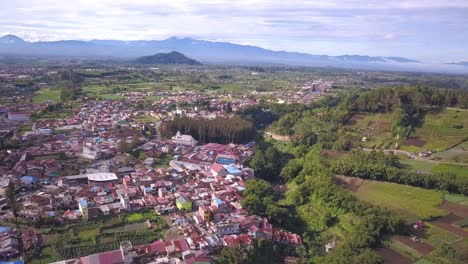 aerial view of a village nestled in the mountains
