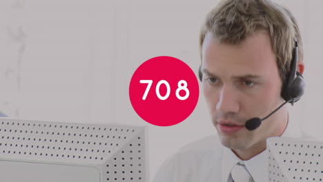 animation of changing numbers over man wearing phone headset