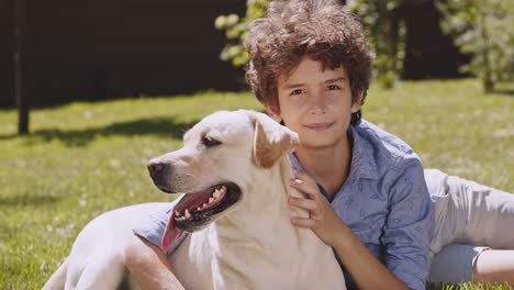 boy and dog in the park