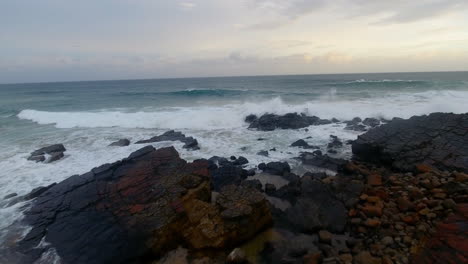 cinematic aerial footage of coffee bay in south africa at sunrise