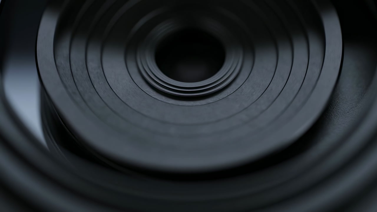 Macro Camera Lens Aperture Rings Visible With Concentric Grooves And Smooth Metal Surfaces With Shallow Depth