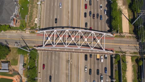 Birds-eye-view-of-car-traffic-on-59-South-freeway-in-Houston,-Texas