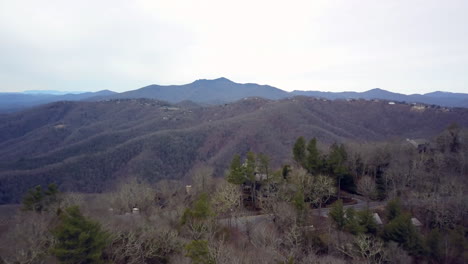 Aerial-of-Grandfather-Mountain-in-the-background-as-seen-from-high-above-Blowing-Rock-North-Carolina