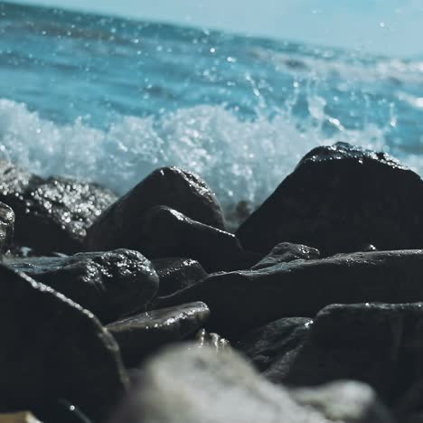 powerful waves crushing on a rocky beach