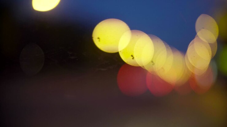 Defocused traffic lights at night in Moscow