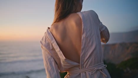 graceful woman back dancing sunset nature performing choreography cliff closeup