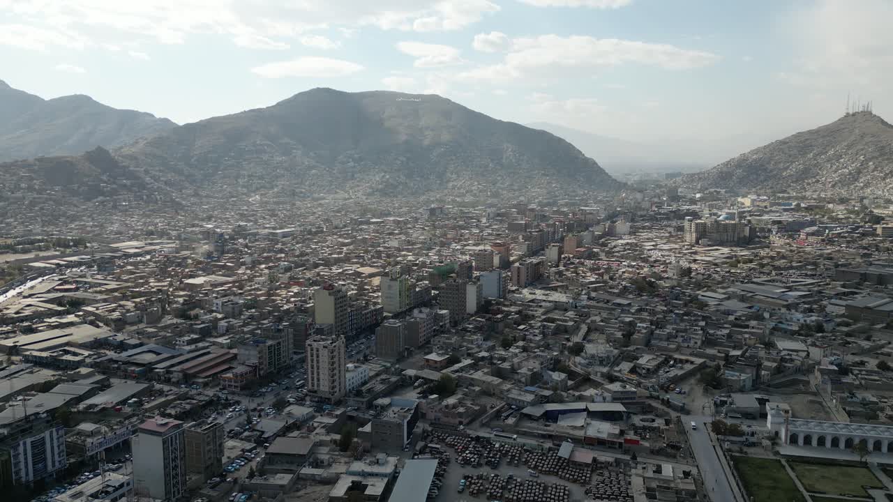 Kabul Drone Aerial, city centerdowntown, Afghanistan, Hindu Kush mountains in background