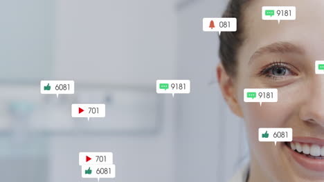 animation of social media icons floating against half face portrait of caucasian woman smiling