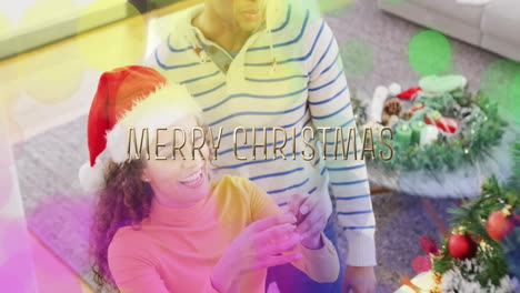 decorating christmas tree, couple with merry christmas text animation