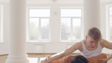 Couple-Of-Male-Contemporary-Dancers-Dancing-Together-In-The-Studio-1