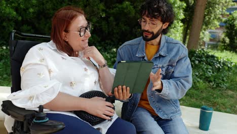 two people talking outdoors