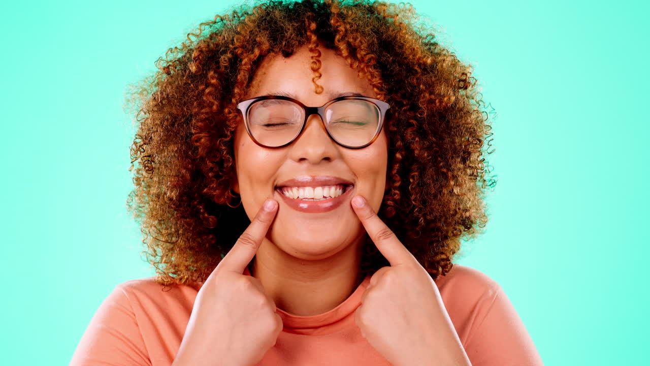Face, black woman and pointing to mouth