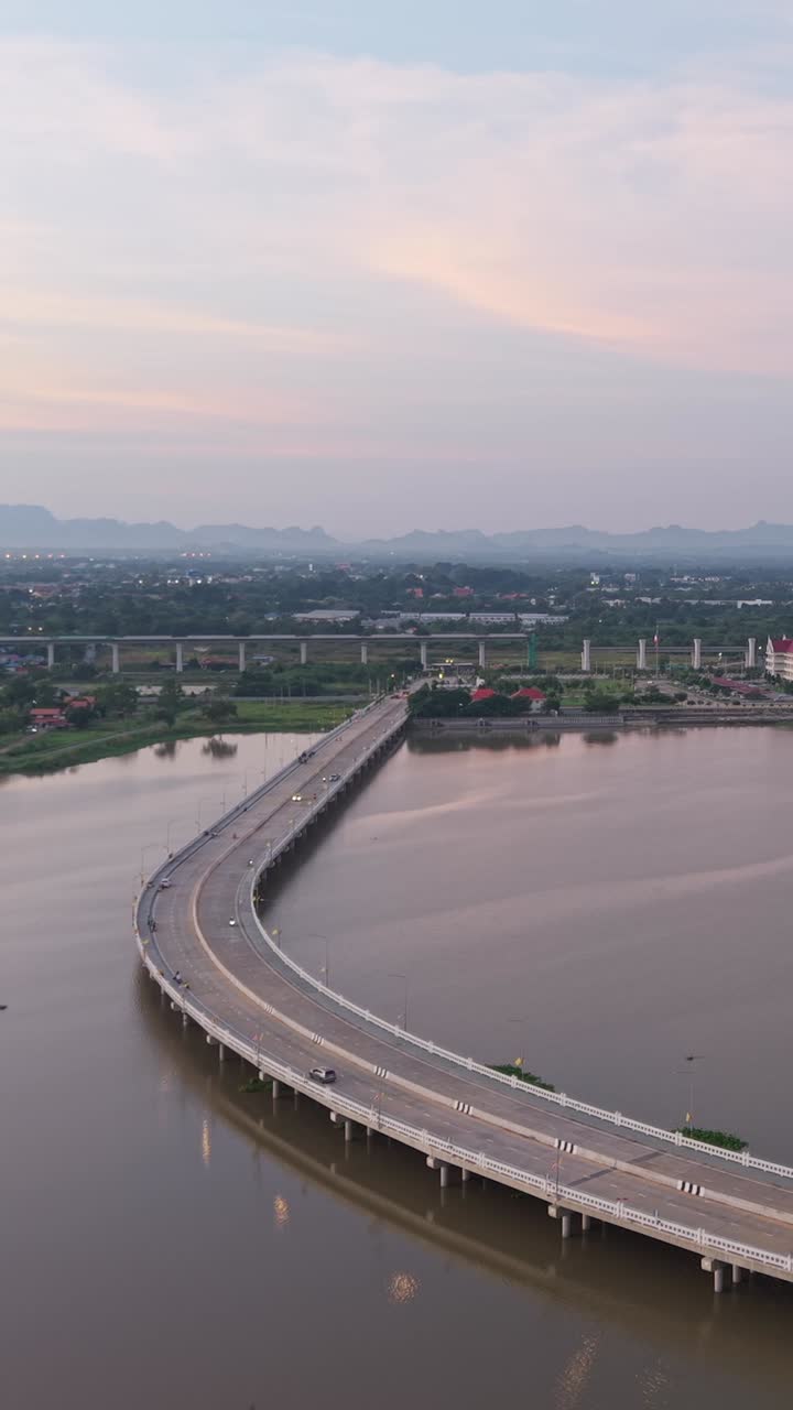 Scenic Bridge Over River at Sunset