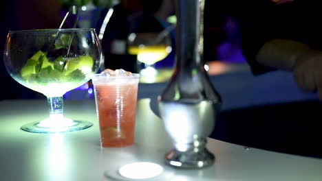 preparing a strawberry drink at a wedding party