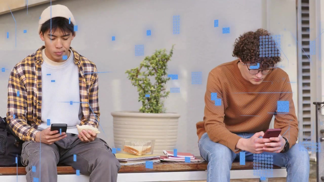 Two male students sitting on bench, phones emitting blue digital overlay, one snacking, studying
