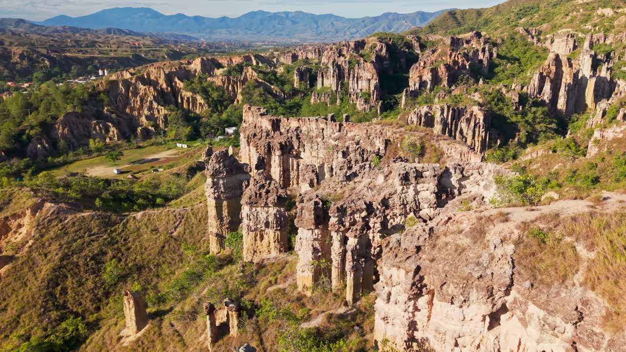 Stunning aerial view flying over the unique rock formations of los estoraques in colombia