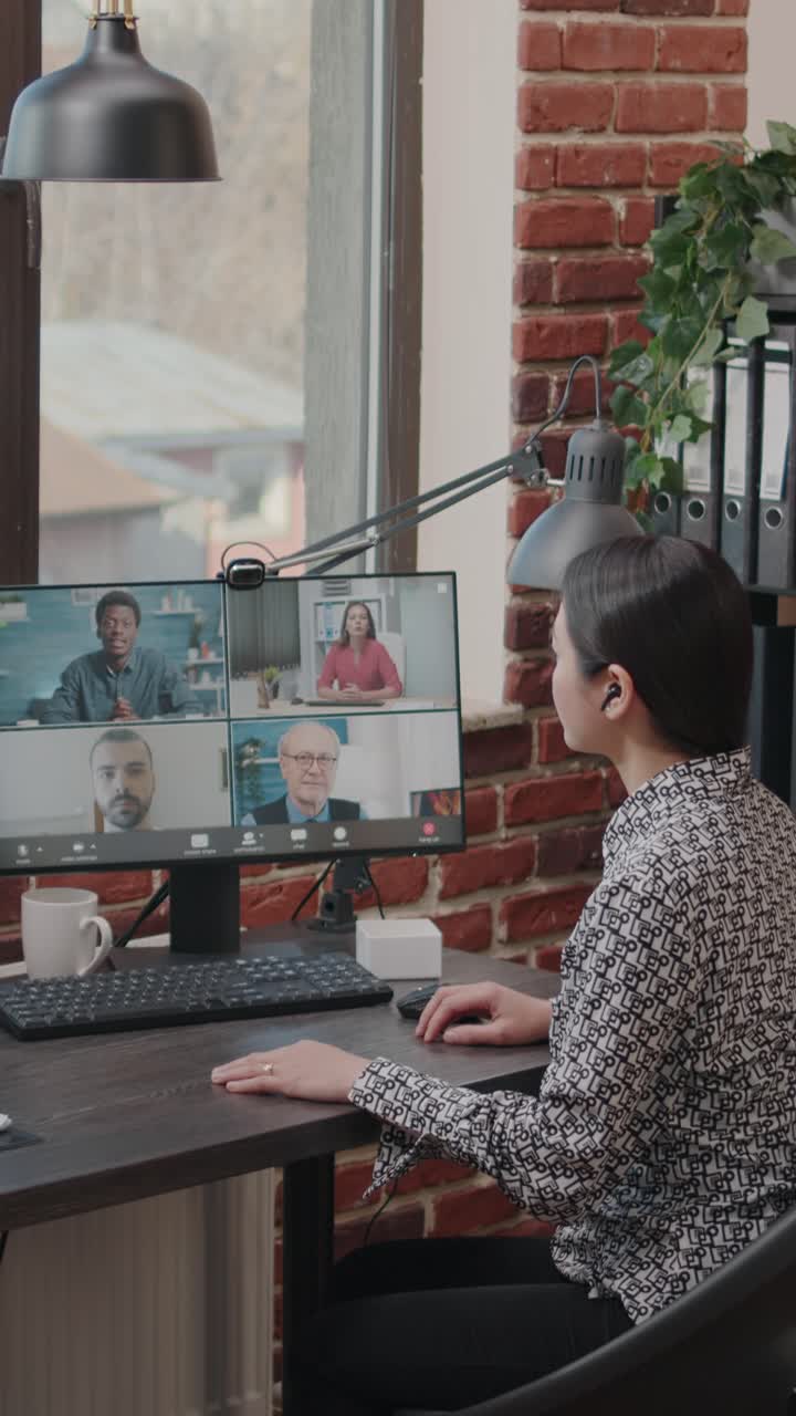 Woman on video call with colleagues