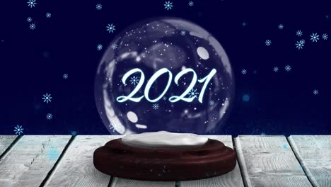 Animation-of-2021-in-snow-globe-on-wooden-boards,-shooting-star-and-snow-falling