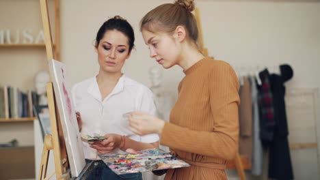 Women Painting in an Art Studio