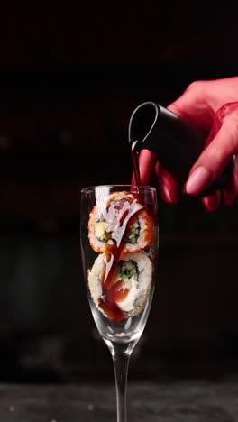 creative sushi presentation in a champagne glass