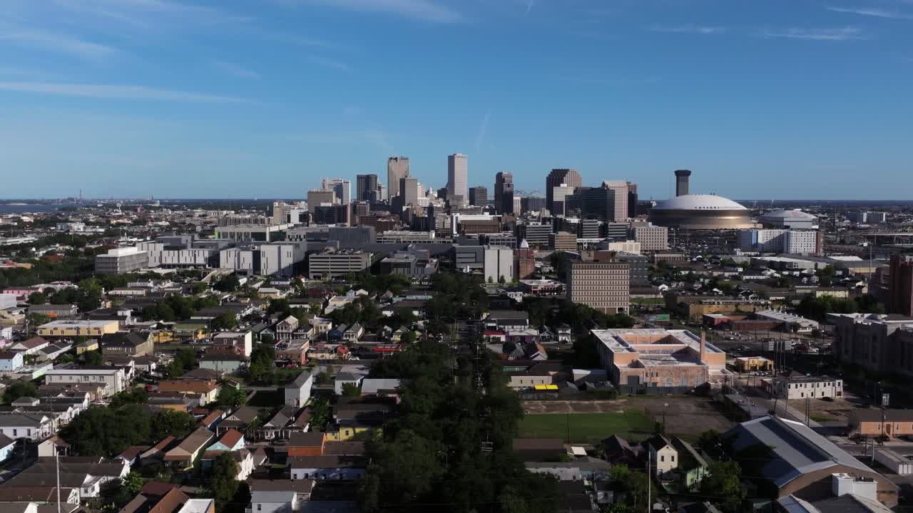 Drone Flying Away from Downtown New Orleans Skyline - Summer Day