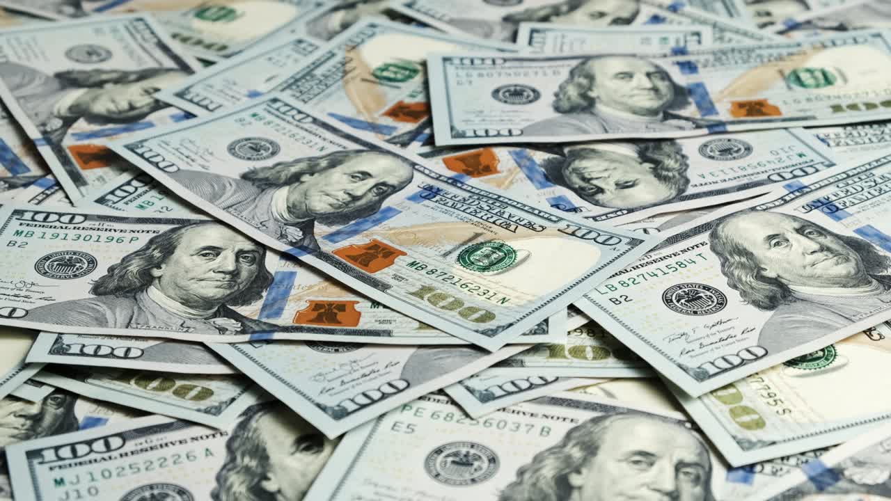 cierre de la moneda billetes de dólar de estados unidos. ingresos y concepto de negocio.