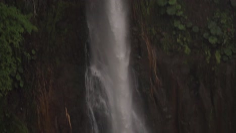 a view of the la catarata del toro waterfall in costa rica, with its impressive cascade of water plunging into a pool