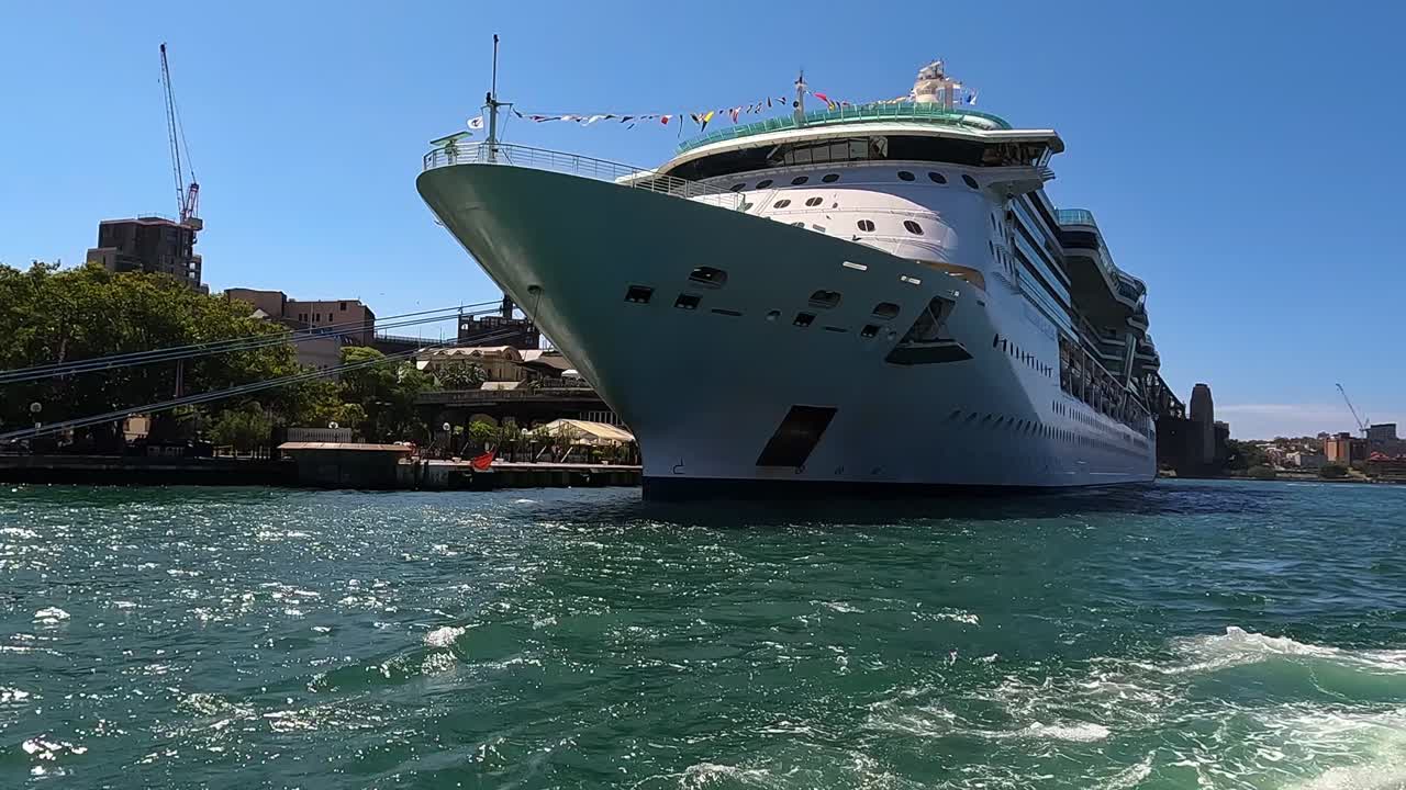 Impressive cruise vessel sitting moored alongside Sydney Harbour pier