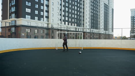 sportsman jogging in an expansive outdoor sport arena, captured mid-stride, emphasizing athleticism and urban setting with high-rise buildings in the background