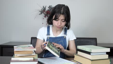 girl researching with books