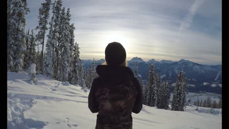 Woman-standing-on-the-snow-covered-landscape-4k