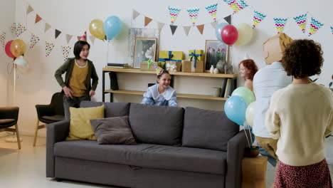 kids playing around the sofa