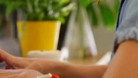 Close-up-of-beautiful-executive-using-laptop-at-table-4k