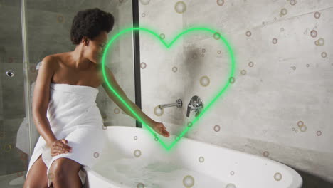 woman sitting on bathtub edge reaching faucet in health scene with bubbles, neon heart