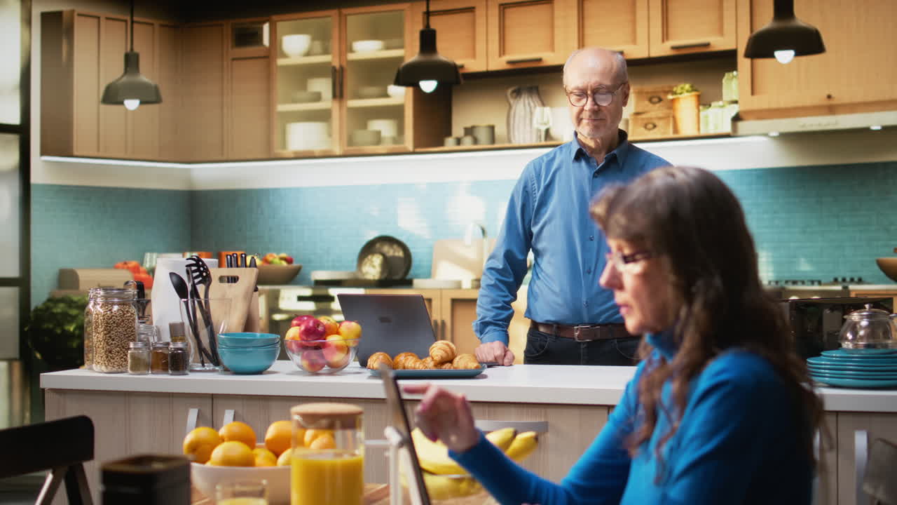 Portrait of senior man enjoying peaceful retired life in rustic kitchen at home